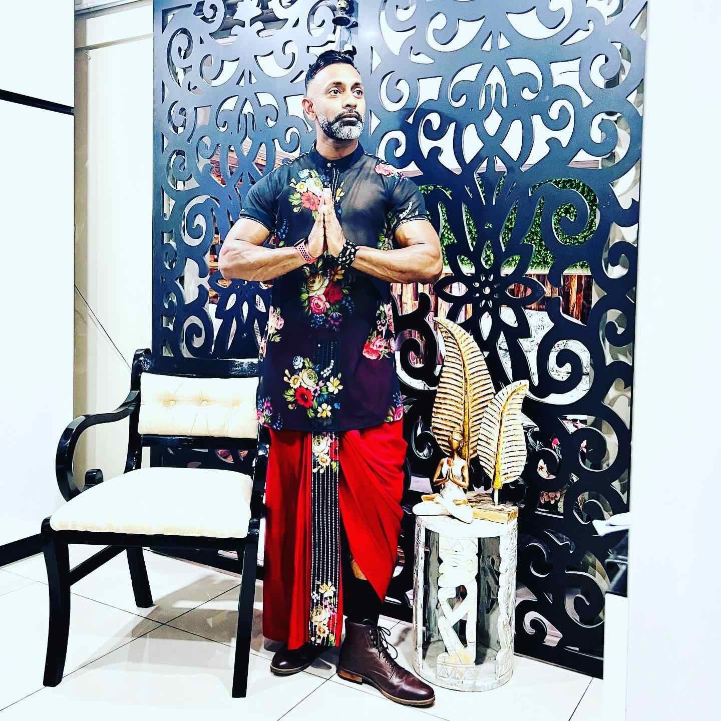 Floral kurta paired with red sulu — cultural occasion wear